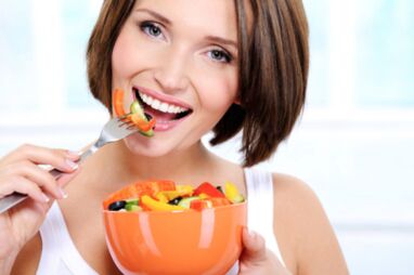 The girl is losing weight with proper nutrition